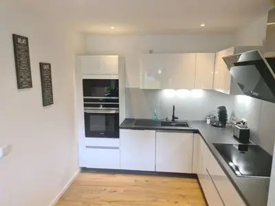 Küche/Küchenzeile in der Unterkunft Kernsan. Souterrain-Wohnung 60qm mit Pool Blick