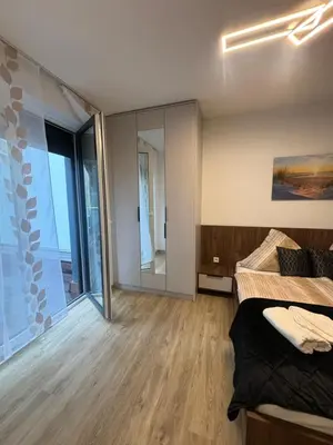 Ein Bett oder Betten in einem Zimmer der Unterkunft Lenti Düsseldorfer Apartment’s