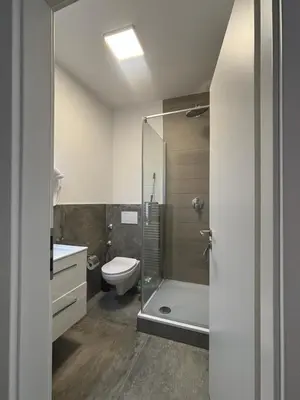 Ein Badezimmer in der Unterkunft Lenti Düsseldorfer Apartment’s
