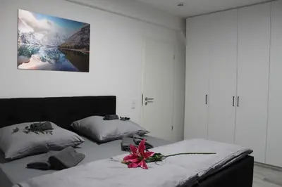 Ein Bett oder Betten in einem Zimmer der Unterkunft Mont Apartments