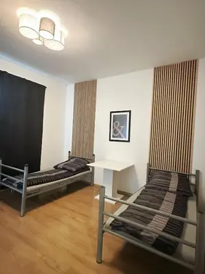 Ein Bett oder Betten in einem Zimmer der Unterkunft 2 schlafenzimmer Waschmaschine Eller