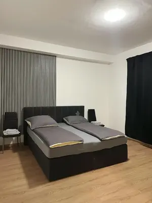 Ein Bett oder Betten in einem Zimmer der Unterkunft 2 schlafenzimmer Waschmaschine Eller