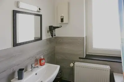 Ein Badezimmer in der Unterkunft BIG Apartment bis 7 Personen