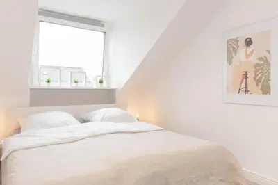 Ein Bett oder Betten in einem Zimmer der Unterkunft Mc‘Maggies Atelier