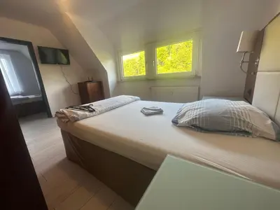 Ein Bett oder Betten in einem Zimmer der Unterkunft Monteur- und Urlaubsunterkünfte