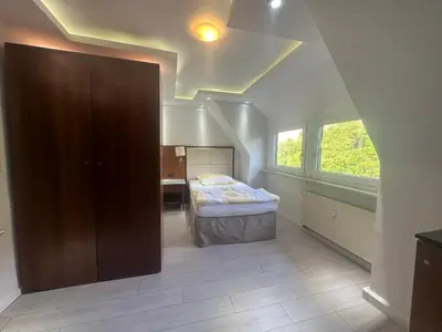 Ein Bett oder Betten in einem Zimmer der Unterkunft Monteur- und Urlaubsunterkünfte