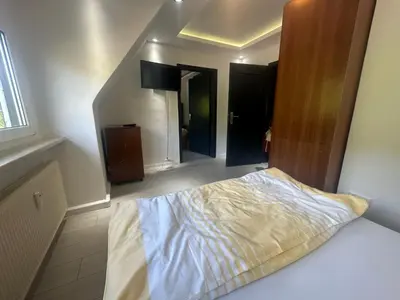 Ein Bett oder Betten in einem Zimmer der Unterkunft Monteur- und Urlaubsunterkünfte