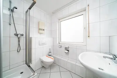 Ein Badezimmer in der Unterkunft G & L Hotel Dortmund