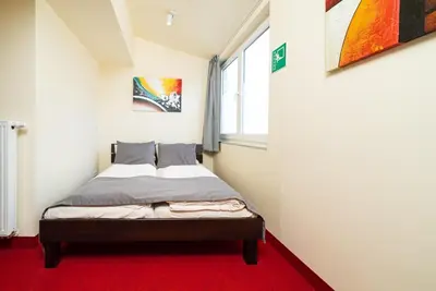 Ein Bett oder Betten in einem Zimmer der Unterkunft Reinoldus Hotel Dortmund