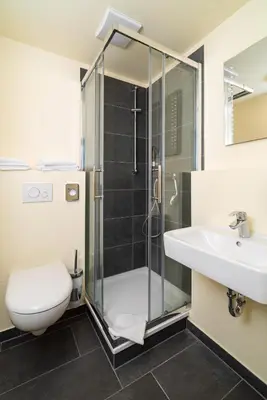 Ein Badezimmer in der Unterkunft Reinoldus Hotel Dortmund