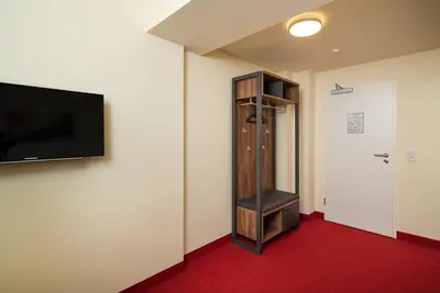 TV/Unterhaltungsangebot in der Unterkunft Reinoldus Hotel Dortmund