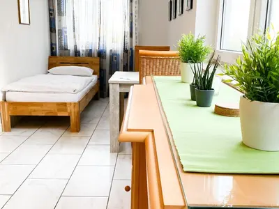 Ein Bett oder Betten in einem Zimmer der Unterkunft Zentrumsnah und Grün zentral Wuppertal/Remscheid