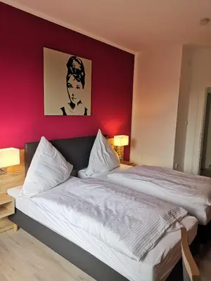 Ein Bett oder Betten in einem Zimmer der Unterkunft Becky´s Kolpinghaus