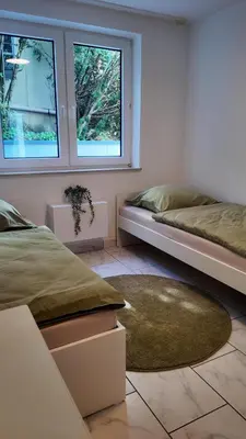 Ein Bett oder Betten in einem Zimmer der Unterkunft 1-5 Pers. Beeindruckende Aussicht, modern+zentral Wuppertal