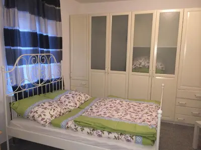 Ein Bett oder Betten in einem Zimmer der Unterkunft White House Bochum Ehrenfeld