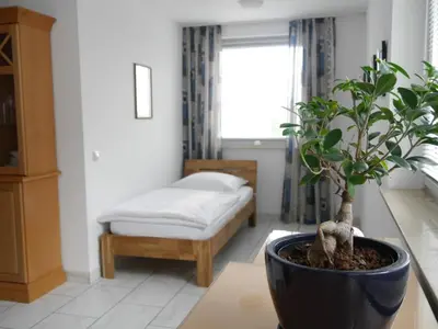 Ein Bett oder Betten in einem Zimmer der Unterkunft 1-3 Pers. Zentrumsnah und modern - Wuppertal/Remscheid