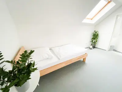 Ein Bett oder Betten in einem Zimmer der Unterkunft 1-4 Pers. Moderne 2-Etagen-Wohnung - nur 0,3 km vom Zentrum