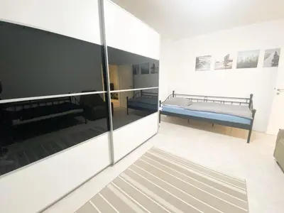 Ein Bett oder Betten in einem Zimmer der Unterkunft 1-3 Pers. 0,9 km zum Zentrum - moderne Wohnung in Remscheid