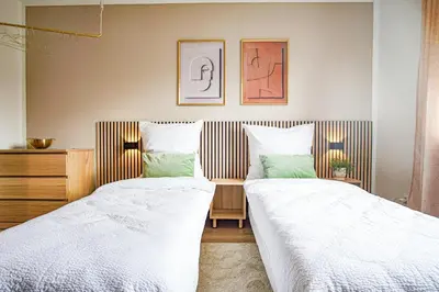 Ein Bett oder Betten in einem Zimmer der Unterkunft HOMEFY - Boho Studio