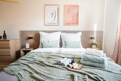Ein Bett oder Betten in einem Zimmer der Unterkunft HOMEFY - Boho Studio