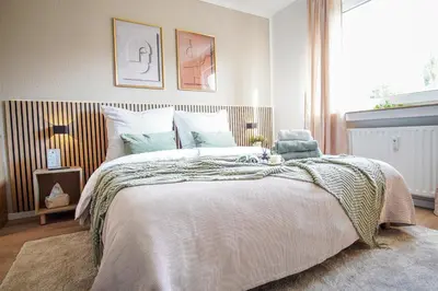 Ein Bett oder Betten in einem Zimmer der Unterkunft HOMEFY - Boho Studio