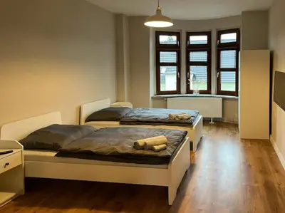 Ein Bett oder Betten in einem Zimmer der Unterkunft Nachbar des Weltkulturerbes Zeche Zollverein! GE1R