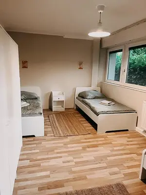 Ein Bett oder Betten in einem Zimmer der Unterkunft Wohnen im 3 Ländereck! Essen, Mülheim, Oberhausen. BSEG