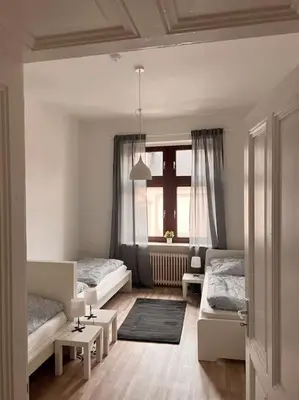 Ein Bett oder Betten in einem Zimmer der Unterkunft Frisch renovierte Altbau Whg