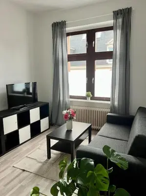 Ein Sitzbereich in der Unterkunft Frisch renovierte Altbau Whg