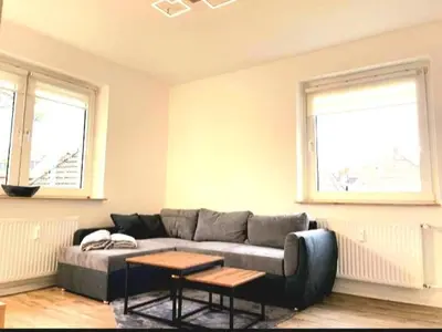 Ein Sitzbereich in der Unterkunft City Apartment 2#Netflix &Wlan &Kingsize Bett & Kaffee Maschine & Zentral & 500m Innenhafen & 2 min U Bahn