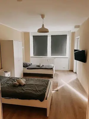 Ein Bett oder Betten in einem Zimmer der Unterkunft Wohnen im 3 Ländereck! Essen, Mülheim, Oberhausen! BS2HL