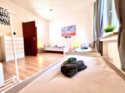 Ein Bett oder Betten in einem Zimmer der Unterkunft Neu: 3 Bedroom w/ 6 Beds in Hagen, 7min to A1