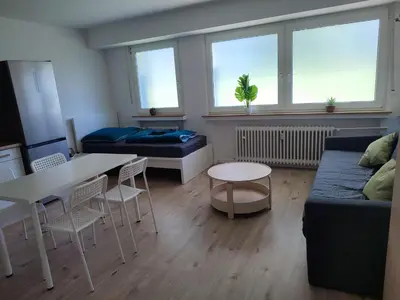 Ein Sitzbereich in der Unterkunft Moderne Ferienwohnung Messe Monteurwohnung Business Appartement Ratingen 4-5 P, Flughafen Düsseldorf