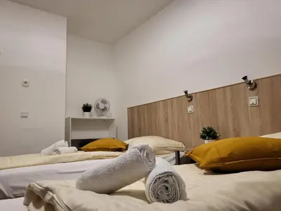 Ein Bett oder Betten in einem Zimmer der Unterkunft Hotel Mettmann