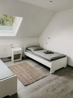 Ein Bett oder Betten in einem Zimmer der Unterkunft Wohnen im 3 Ländereck! Essen, Mülheim, Oberhausen. BSDG