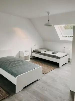 Ein Bett oder Betten in einem Zimmer der Unterkunft Wohnen im 3 Ländereck! Essen, Mülheim, Oberhausen. BSDG