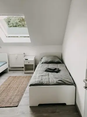 Ein Bett oder Betten in einem Zimmer der Unterkunft Wohnen im 3 Ländereck! Essen, Mülheim, Oberhausen. BSDG
