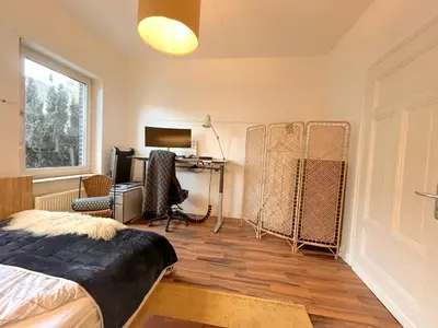 Ein Bett oder Betten in einem Zimmer der Unterkunft Dein Ankerplatz in Mülheim Ruhr - Traditionelle Zechenhaushälfte