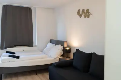 Ein Bett oder Betten in einem Zimmer der Unterkunft Business Apartment 1 Essen