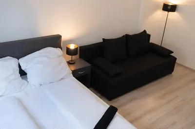 Ein Bett oder Betten in einem Zimmer der Unterkunft Business Apartment 1 Essen