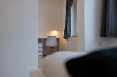 Ein Bett oder Betten in einem Zimmer der Unterkunft Business Apartment 1 Essen