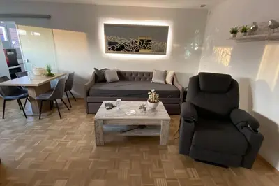 Ein Sitzbereich in der Unterkunft MyHome-Tiny -stilvollen Ruhepol