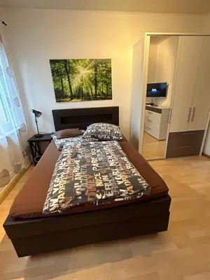 Ein Bett oder Betten in einem Zimmer der Unterkunft Privatzimmer Haus Grünewald