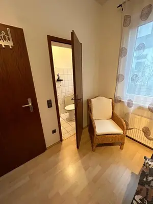 Ein Sitzbereich in der Unterkunft Privatzimmer Haus Grünewald