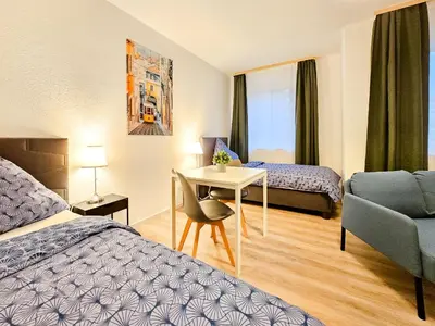 Ein Bett oder Betten in einem Zimmer der Unterkunft Centerline Apartments Solingen