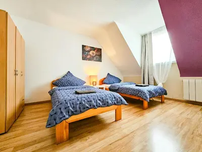 Ein Bett oder Betten in einem Zimmer der Unterkunft Centerline Apartments Solingen
