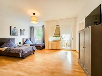 Ein Bett oder Betten in einem Zimmer der Unterkunft Centerline Apartments Solingen