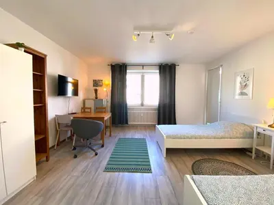 Ein Bett oder Betten in einem Zimmer der Unterkunft Nice Apartment in Essen
