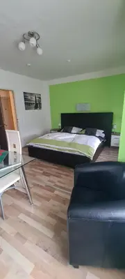 Ein Bett oder Betten in einem Zimmer der Unterkunft Hotel Zur Aue