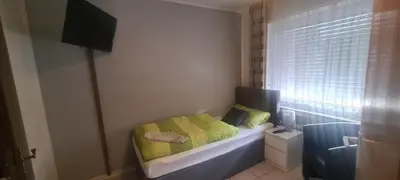 Ein Bett oder Betten in einem Zimmer der Unterkunft Hotel Zur Aue